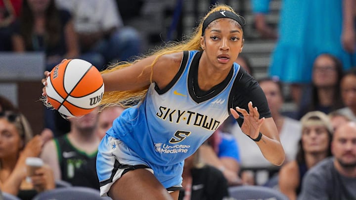 Chicago Sky forward Angel Reese (5) dribbles against the Minnesota Lynx in the first quarter at Target Center.