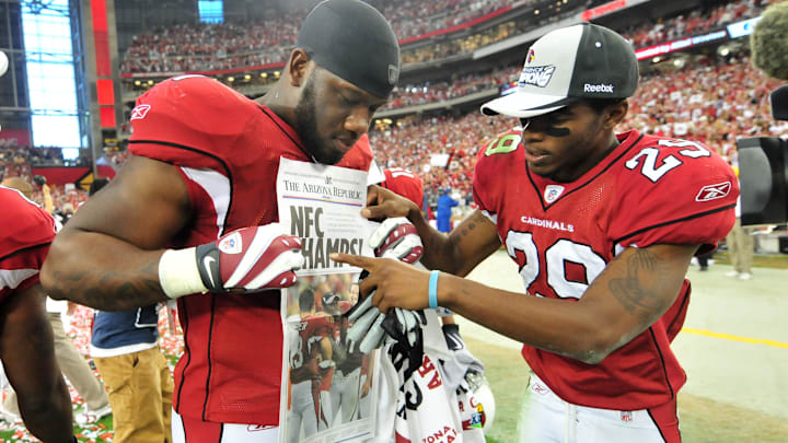 Jan. 18, 2009; Glendale, AZ, USA; Arizona Cardinals defensive end Kenny Iwebema (left) and