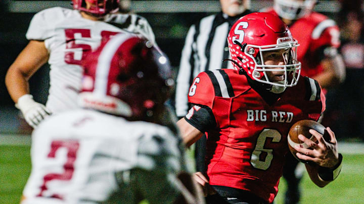 Steubenville's Aiden Davis on a touchdown run against Dover during a Division III, Region 11 semifinal game, Friday, Nov. 15, at Carrollton High School’s Warrior Stadium, in Carrollton.