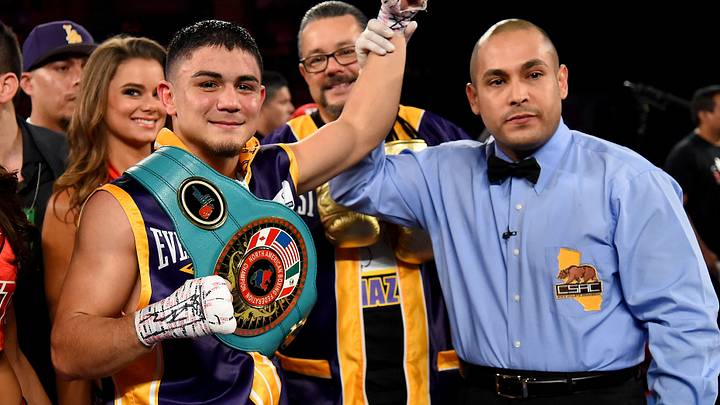 Dec 17, 2016; Los Angeles, CA, USA; Joseph Diaz, Jr. (gold gloves) defeated Horacio Garcia (black gloves) in their NABF featherweight title fight at The Forum. Mandatory Credit: Jayne Kamin-Oncea-USA TODAY Sports Dec 17, 2016; Los Angeles, CA, USA; Joseph Diaz, Jr. (gold gloves) defeated Horacio Garcia (black gloves) in their NABF featherweight title fight at The Forum. Mandatory Credit: Jayne Kamin-Oncea-USA TODAY Sports