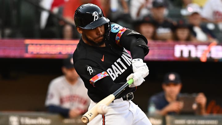 Aug 22, 2025; Baltimore, Maryland, USA;  Baltimore Orioles outfielder Jeremiah Jackson (82) singles during the first inning against the Houston Astros at Oriole Park at Camden Yards. Mandatory Credit: James A. Pittman-Imagn Images