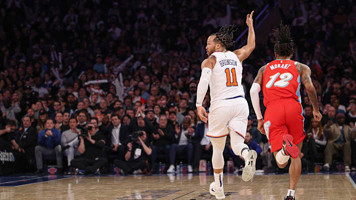 Jan 27, 2025; New York, New York, USA; New York Knicks guard Jalen Brunson (11) celebrates after a three point basket during the second half in front of Memphis Grizzlies guard Ja Morant (12) at Madison Square Garden. Mandatory Credit: Vincent Carchietta-Imagn Images Jan 27, 2025; New York, New York, USA; New York Knicks guard Jalen Brunson (11) celebrates after a three point basket during the second half in front of Memphis Grizzlies guard Ja Morant (12) at Madison Square Garden. Mandatory Credit: Vincent Carchietta-Imagn Images