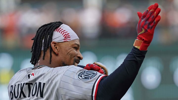Mar 26, 2026; Baltimore, Maryland, USA; Minnesota Twins outfielder Byron Buxton (25) gestures towards teammates following his triple during the eighth inning against the Baltimore Orioles at Oriole Park at Camden Yards. Mandatory Credit: Mitch Stringer-Imagn Images Mar 26, 2026; Baltimore, Maryland, USA; Minnesota Twins outfielder Byron Buxton (25) gestures towards teammates following his triple during the eighth inning against the Baltimore Orioles at Oriole Park at Camden Yards. Mandatory Credit: Mitch Stringer-Imagn Images