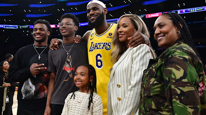 Los Angeles Lakers forward LeBron James (6) poses for photos with his sons Bronny and Bryce Maximus, daughter Zhuri, wife Savannah and mother Gloria after the game against the Oklahoma City Thunder at Crypto.com Arena. Los Angeles Lakers forward LeBron James (6) poses for photos with his sons Bronny and Bryce Maximus, daughter Zhuri, wife Savannah and mother Gloria after the game against the Oklahoma City Thunder at Crypto.com Arena.