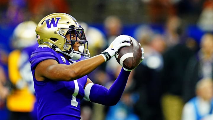 Jan 1, 2024; New Orleans, LA, USA; Washington Huskies wide receiver Rome Odunze (1) warms up before