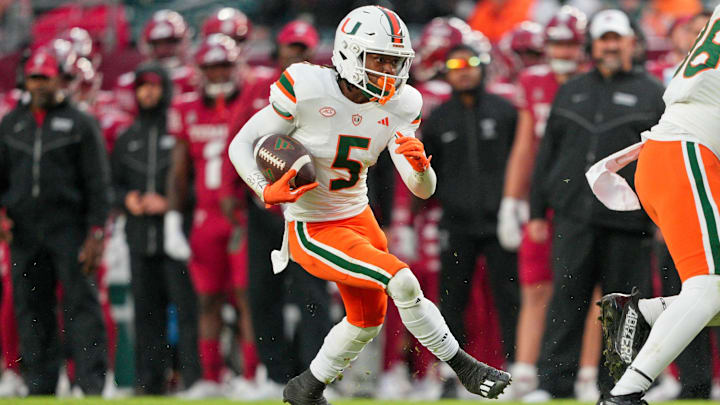 Sep 23, 2023; Philadelphia, Pennsylvania, USA; Miami Hurricanes wide receiver Ray Ray Joseph (5) picks up a first down in the fourth quarter against the Temple Owls at Lincoln Financial Field. Mandatory Credit: Andy Lewis-Imagn Images Sep 23, 2023; Philadelphia, Pennsylvania, USA; Miami Hurricanes wide receiver Ray Ray Joseph (5) picks up a first down in the fourth quarter against the Temple Owls at Lincoln Financial Field. Mandatory Credit: Andy Lewis-Imagn Images