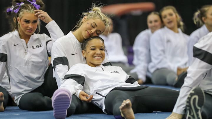 LSU gymnastics stars Livvy Dunne and Haleigh Bryant relax after the Purple & Gold Podium Challenge.