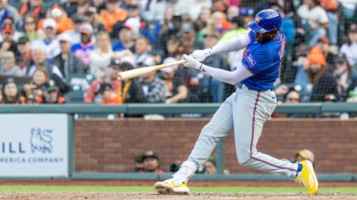 Jul 27, 2025; San Francisco, California, USA; New York Mets third baseman Ronny Mauricio (10) hits a solo home run during the seventh inning San Francisco Giants at Oracle Park. Mandatory Credit: Bob Kupbens-Imagn Images