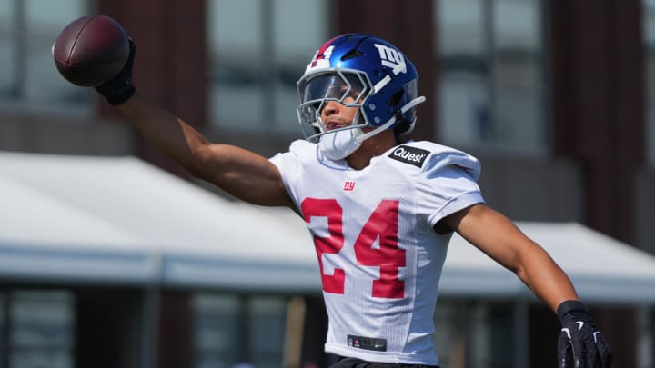 Jul 26, 2024; East Rutherford, NJ, USA; New York Giants safety Dane Belton (24) catches a pass with one hand during training camp at Quest Diagnostics Training Center. Jul 26, 2024; East Rutherford, NJ, USA; New York Giants safety Dane Belton (24) catches a pass with one hand during training camp at Quest Diagnostics Training Center.