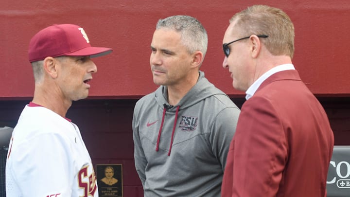 Florida State vice president and athletics director Michael Alford (right), football head coach Mike Norvell (middle) and baseball head coach Link Jarrett talk pregame during opening day against James Madison on Feb. 17, 2023, at Dick Howser Stadium.

Fsujmubaseball1 1 Of 1