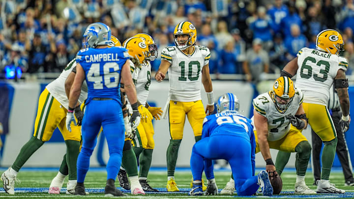 Green Bay Packers quarterback Jordan Love (10) tries to yell out the play over the roar of the crowd at Ford Field.
