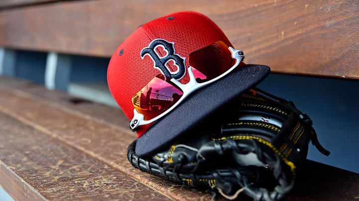 Mar 5, 2019; West Palm Beach, FL, USA; A detailed view of a Boston Red Sox cap, sunglasses and glove in the dugout during a spring training game between the Washington Nationals and the Boston Red Sox at FITTEAM Ballpark of the Palm Beaches. Mandatory Credit: Jasen Vinlove-Imagn Images Mar 5, 2019; West Palm Beach, FL, USA; A detailed view of a Boston Red Sox cap, sunglasses and glove in the dugout during a spring training game between the Washington Nationals and the Boston Red Sox at FITTEAM Ballpark of the Palm Beaches. Mandatory Credit: Jasen Vinlove-Imagn Images
