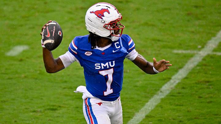 Oct 3, 2026; Dallas, Texas, USA; SMU Mustangs quarterback Kevin Jennings (7) throws the ball against the Boston College Eagles during the first half at Gerald J. Ford Stadium. Mandatory Credit: Jerome Miron-Imagn Images Oct 3, 2026; Dallas, Texas, USA; SMU Mustangs quarterback Kevin Jennings (7) throws the ball against the Boston College Eagles during the first half at Gerald J. Ford Stadium. Mandatory Credit: Jerome Miron-Imagn Images