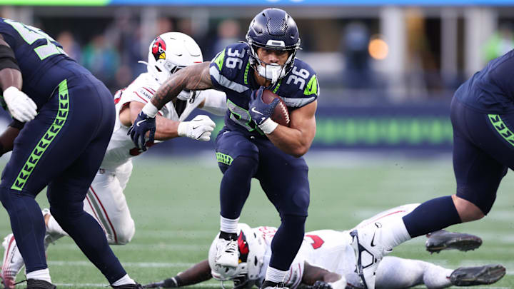 Nov 9, 2025; Seattle, Washington, USA; Seattle Seahawks running back George Holani (36) rushes during the fourth quarter against the Arizona Cardinals at Lumen Field. Mandatory Credit: Kevin Ng-Imagn Images