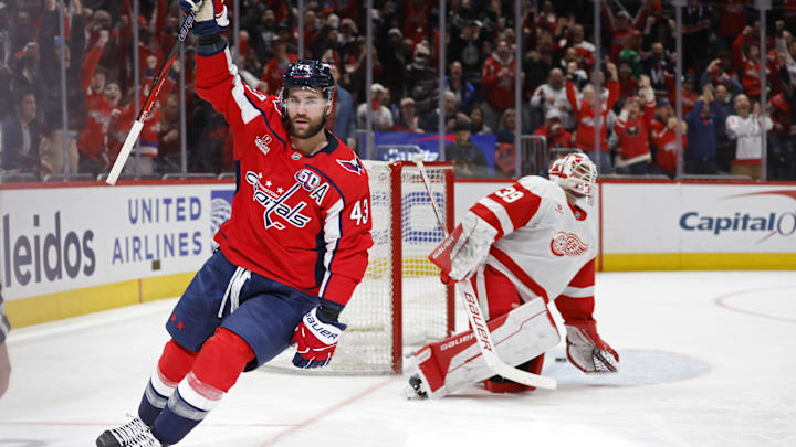 Mar 7, 2025; Washington, District of Columbia, USA; Washington Capitals right wing Tom Wilson (43) celebrates after scoring a goal on Detroit Red Wings goaltender Cam Talbot (39) in the third period at Capital One Arena. Mandatory Credit: Geoff Burke-Imagn Images