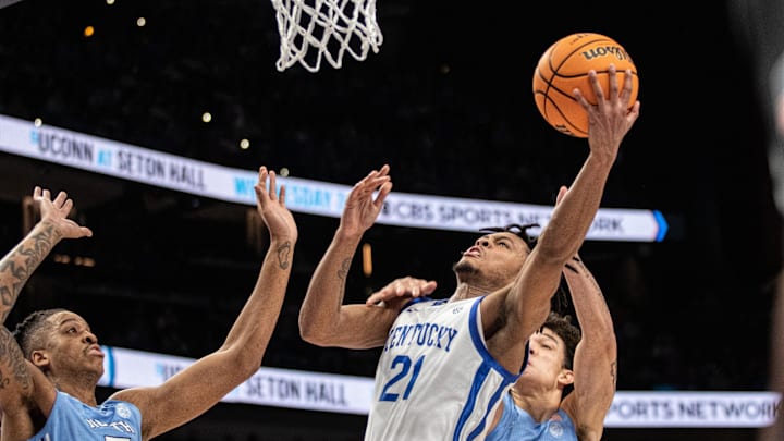 Dec 16, 2023; Atlanta, Georgia, USA; Kentucky Wildcats guard D.J. Wagner (21) attempts layup shot