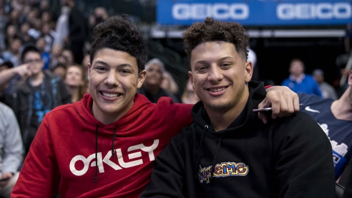 Kansas City Chiefs quarterback Patrick Mahomes (right) watches the game between the Dallas Mavericks and the Houston Rockets  with his brother Jackson Mahomes (left) at the American Airlines Center. 