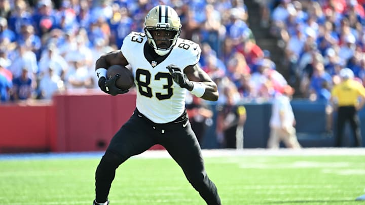 Sep 28, 2025; Orchard Park, New York, USA; New Orleans Saints tight end Juwan Johnson (83) runs for a gain during the fourth quarter against the Buffalo Bills at Highmark Stadium. Mandatory Credit: Mark Konezny-Imagn Images Sep 28, 2025; Orchard Park, New York, USA; New Orleans Saints tight end Juwan Johnson (83) runs for a gain during the fourth quarter against the Buffalo Bills at Highmark Stadium. Mandatory Credit: Mark Konezny-Imagn Images