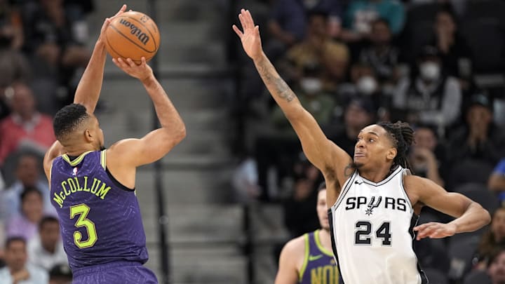 Mar 15, 2025; San Antonio, Texas, USA; New Orleans Pelicans guard CJ McCollum (3) shoots over San Antonio Spurs guard Devin Vassell (24) during the second half at Frost Bank Center. Mandatory Credit: Scott Wachter-Imagn Images Mar 15, 2025; San Antonio, Texas, USA; New Orleans Pelicans guard CJ McCollum (3) shoots over San Antonio Spurs guard Devin Vassell (24) during the second half at Frost Bank Center. Mandatory Credit: Scott Wachter-Imagn Images