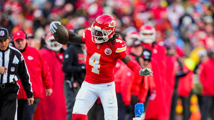 Dec 14, 2025; Kansas City, Missouri, USA; Kansas City Chiefs wide receiver Rashee Rice (4) runs with the ball against Los Angeles Chargers cornerback Benjamin St-Juste (24) during the first half at GEHA Field at Arrowhead Stadium. Mandatory Credit: Jay Biggerstaff-Imagn Images Dec 14, 2025; Kansas City, Missouri, USA; Kansas City Chiefs wide receiver Rashee Rice (4) runs with the ball against Los Angeles Chargers cornerback Benjamin St-Juste (24) during the first half at GEHA Field at Arrowhead Stadium. Mandatory Credit: Jay Biggerstaff-Imagn Images