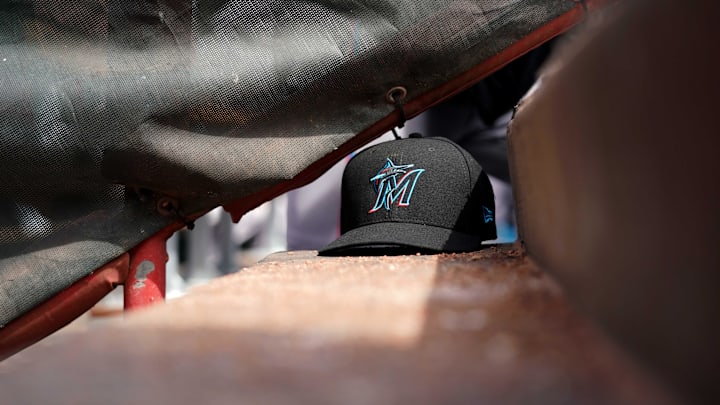 Cincinnati, OH, USA; A view of a New Era Miami Marlins hat in the dugout during the game against the Cincinnati Reds at Great American Ball Park.