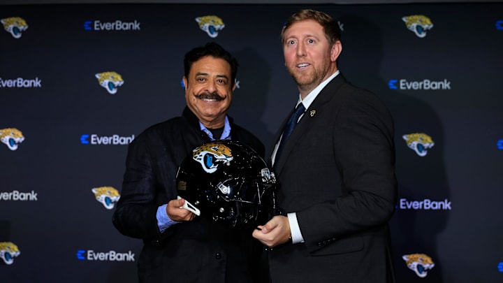 Jaguars owner Shad Khan, left, poses for a photo with new head coach Liam Coen during a press conference Jan. 27. Jaguars owner Shad Khan, left, poses for a photo with new head coach Liam Coen during a press conference Jan. 27.