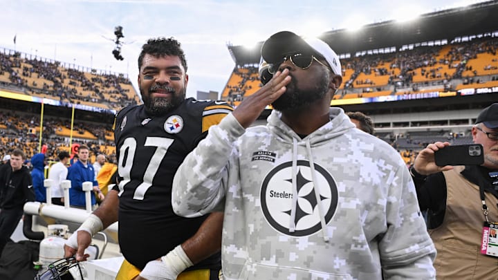 Nov 17, 2024; Pittsburgh, Pennsylvania, USA; Pittsburgh Steelers head coach Mike Tomlin and defensive tackle Cameron Heyward (97)  celebrate a 18-16 victory over the Baltimore Ravens at Acrisure Stadium. Mandatory Credit: Barry Reeger-Imagn Images