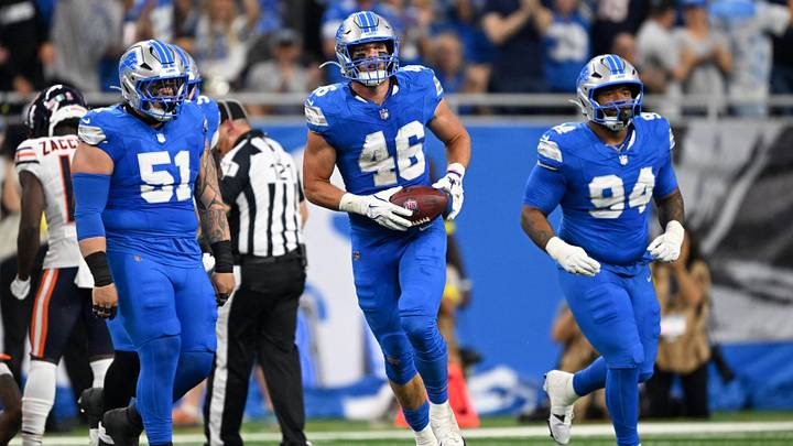 Sep 14, 2025; Detroit, Michigan, USA; Detroit Lions linebacker Jack Campbell (46) carries the ball after a fumble recovery against the Chicago Bears during the first quarter of the game at Ford Field. Mandatory Credit: Lon Horwedel-Imagn Images