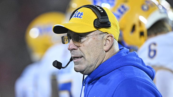 Nov 23, 2024; Louisville, Kentucky, USA;  Pittsburgh Panthers head coach Pat Narduzzi calls a play from the sideline during the second half against the Louisville Cardinals at L&N Federal Credit Union Stadium. Louisville defeated Pittsburgh 37-9. Mandatory Credit: Jamie Rhodes-Imagn Images