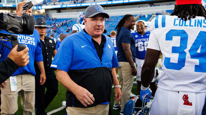 Sep 6, 2025; Lexington, Kentucky, USA; Kentucky Wildcats head coach Mark Stoops makes his way off the field after the game against the Mississippi Rebels at Kroger Field. Mandatory Credit: Jordan Prather-Imagn Images