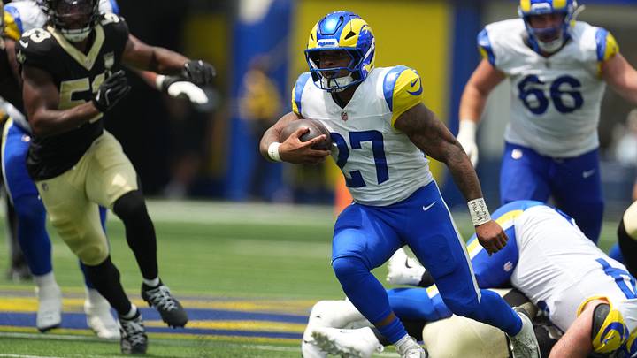Aug 22, 2026; Inglewood, California, USA; Los Angeles Rams running back Jarquez Hunter (27) carries the ball against the New Orleans Saints in the first half at SoFi Stadium. Mandatory Credit: Kirby Lee-Imagn Images