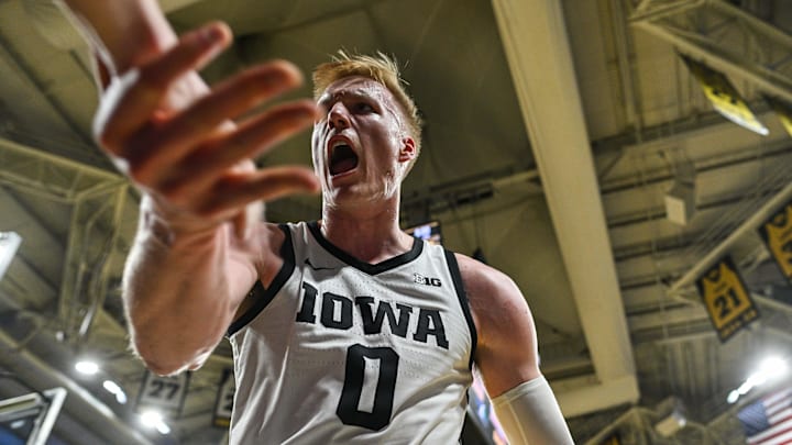 Feb 19, 2025; Iowa City, Iowa, USA; Iowa Hawkeyes forward Even Brauns (0) reacts during the second half against the Oregon Ducks at Carver-Hawkeye Arena. Mandatory Credit: Jeffrey Becker-Imagn Images