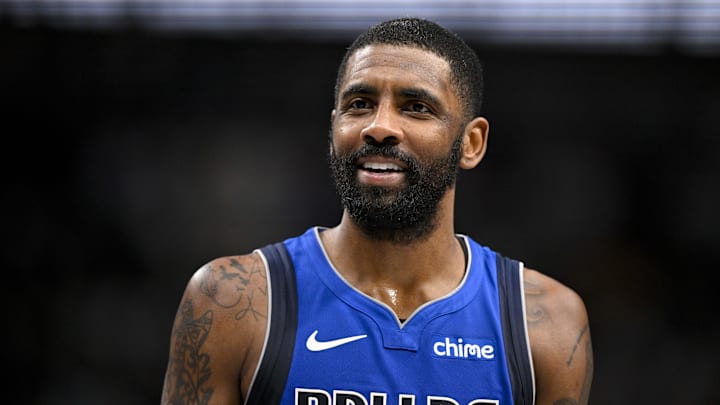 Jan 17, 2025; Dallas, Texas, USA; Dallas Mavericks guard Kyrie Irving (11) talks with the referees during the second quarter against the Oklahoma City Thunder at the American Airlines Center. Mandatory Credit: Jerome Miron-Imagn Images