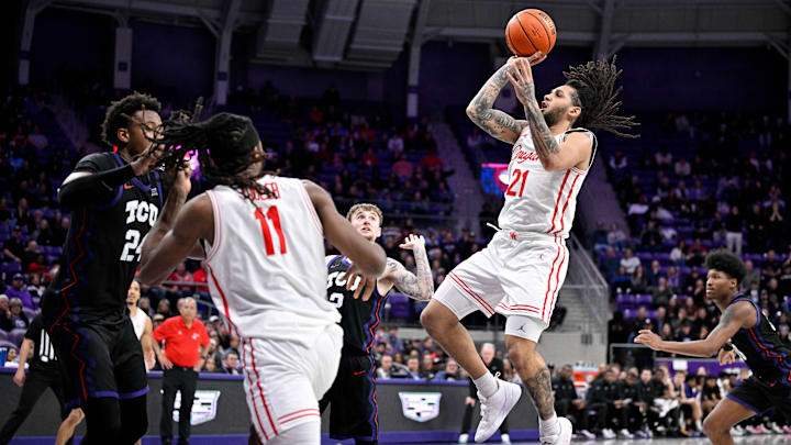 Jan 28, 2026; Fort Worth, Texas, USA; Houston Cougars guard Emanuel Sharp (21) makes a jump shot against the TCU Horned Frogs during the second half at Ed and Rae Schollmaier Arena. 