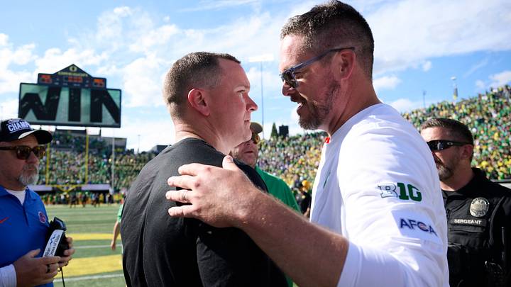 Sep 5, 2026; Eugene, Oregon, USA; Oregon coach Dan Lanning embraces Boise State Broncos coach Spencer Danielson after the Ducks 34-27 win over the Broncos at Autzen Stadium. Troy Wayrynen-Imagn Images Sep 5, 2026; Eugene, Oregon, USA; Oregon coach Dan Lanning embraces Boise State Broncos coach Spencer Danielson after the Ducks 34-27 win over the Broncos at Autzen Stadium. Troy Wayrynen-Imagn Images