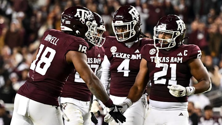 Texas A&M Aggies linebacker Taurean York (21) reacts against the Texas Longhorns at Kyle Field on Nov. 30, 2024.