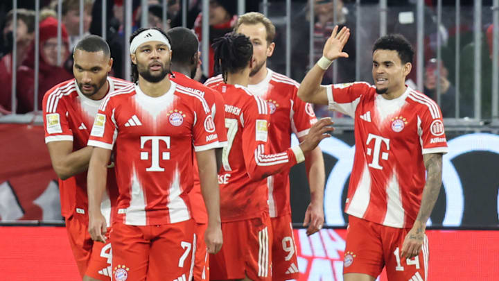 Bayern Munich players celebrating against Hoffenheim.