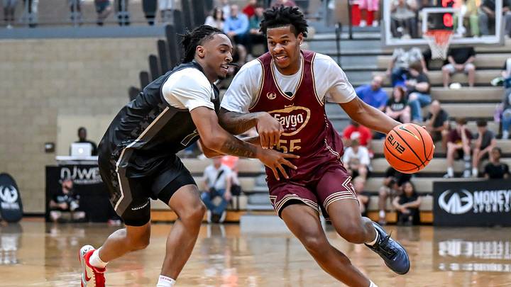 Team Motorcars and Michigan State's Carlos Medlock Jr., left, guards Team Faygo and MSU teammate Jasiah Jervis during the Moneyball Pro-Am on Tuesday, June 23, 2026, at Holt High School. Team Motorcars and Michigan State's Carlos Medlock Jr., left, guards Team Faygo and MSU teammate Jasiah Jervis during the Moneyball Pro-Am on Tuesday, June 23, 2026, at Holt High School.