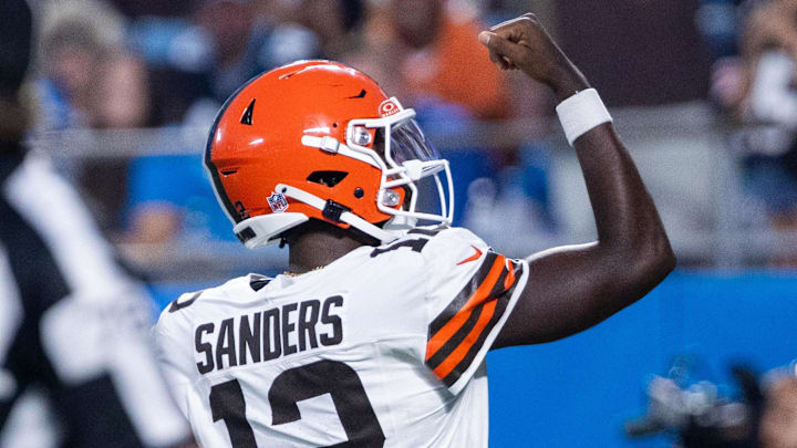 Aug 8, 2025; Charlotte, North Carolina, USA; Cleveland Browns quarterback Shedeur Sanders (12) celebrates after a touchdown in the second quarter against the Carolina Panthers at Bank of America Stadium. Mandatory Credit: Scott Kinser-The USAToday Network via Imagn Images 