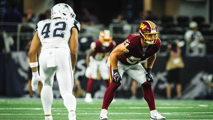 Washington Commanders linebacker Leo Chenal lines up against the Las Vegas Raiders during a preseason game at Allegiant Stadium.