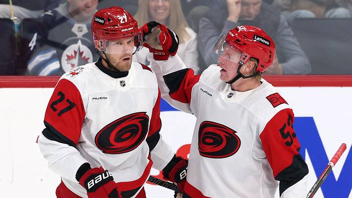 Oct 17, 2026; Winnipeg, Manitoba, CAN; Carolina Hurricanes left wing Nikolaj Ehlers (27) celebrates a goal against the Winnipeg Jets, with Carolina Hurricanes right wing Jackson Blake (53) at Canada Life Centre.  Mandatory Credit: James Carey Lauder-Imagn Images