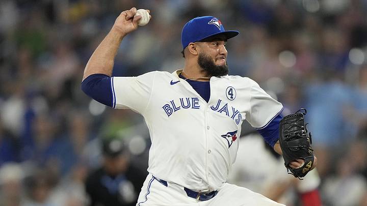 Toronto Blue Jays pitcher Yimi García pitches against the Pittsburgh Pirates during the ninth inning of a 2024 game at Rogers Centre.