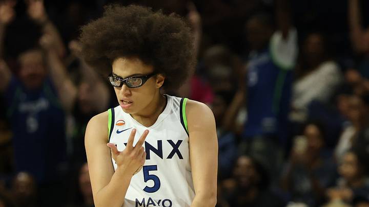 Aug 21, 2026; Washington, District of Columbia, USA; Minnesota Lynx guard Olivia Miles (5) celebrates after a three point field goal against the Washington Mystics in the first half at CareFirst Arena. Mandatory Credit: Geoff Burke-Imagn Images Aug 21, 2026; Washington, District of Columbia, USA; Minnesota Lynx guard Olivia Miles (5) celebrates after a three point field goal against the Washington Mystics in the first half at CareFirst Arena. Mandatory Credit: Geoff Burke-Imagn Images