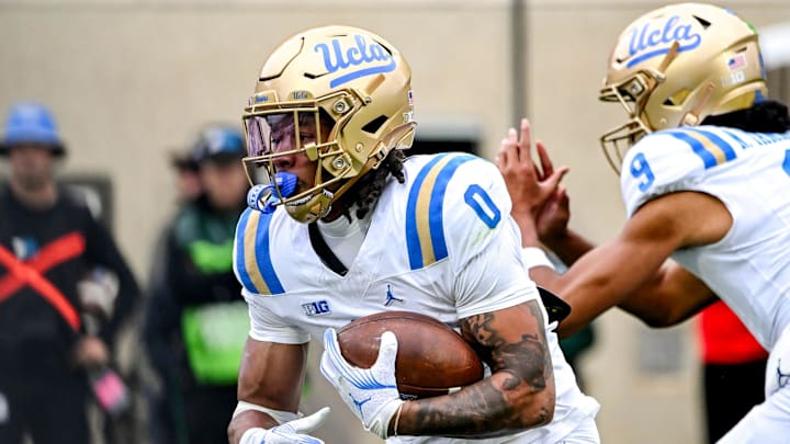 UCLA's Jalen Berger runs the ball against Michigan State during the third quarter on Saturday, Oct. 11, 2025, at Spartan Stadium in East Lansing.