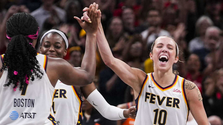 Aug 28, 2024; Indianapolis, Indiana, USA; Indiana Fever guard Lexie Hull (10) high-fives Indiana Fever forward Aliyah Boston (7) during a game between the Indiana Fever and the Connecticut Sun at Gainbridge Fieldhouse. Mandatory Credit: Grace Smith-INDIANAPOLIS STAR-Imagn Images Aug 28, 2024; Indianapolis, Indiana, USA; Indiana Fever guard Lexie Hull (10) high-fives Indiana Fever forward Aliyah Boston (7) during a game between the Indiana Fever and the Connecticut Sun at Gainbridge Fieldhouse. Mandatory Credit: Grace Smith-INDIANAPOLIS STAR-Imagn Images