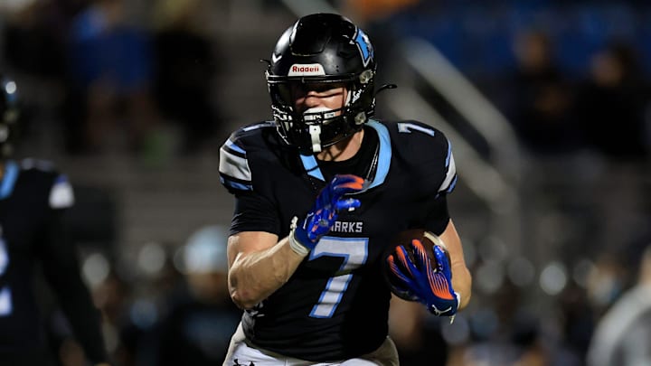 Ponte Vedra's Brian Case (7) rushes for yards during the fourth quarter of a Region 1-5A first-round high school football playoff matchup Friday, Nov. 15, 2024 at Ponte Vedra High School in Ponte Vedra Beach, Fla. The Ponte Vedra Sharks defeated the Beachside Barracudas 45-21.