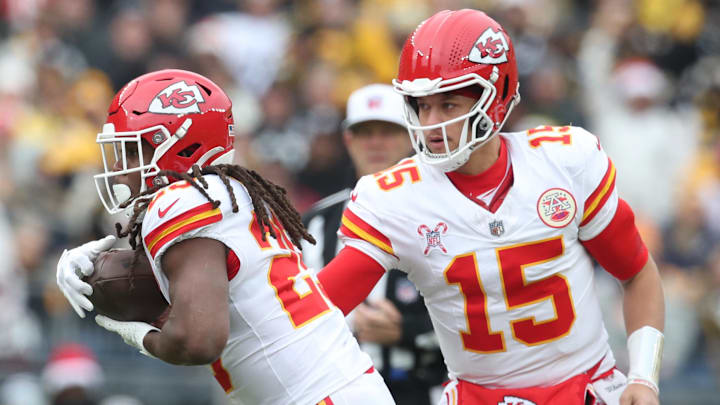 Dec 25, 2024; Pittsburgh, Pennsylvania, USA;  Kansas City Chiefs running back Kareem Hunt (29) takes a hand-off from quarterback Patrick Mahomes (15) against the Pittsburgh Steelers during the first quarter at Acrisure Stadium. Mandatory Credit: Charles LeClaire-Imagn Images
