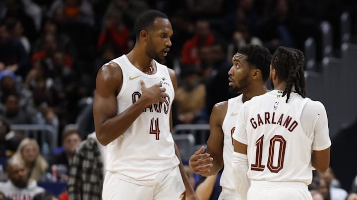 Dec 12, 2025; Washington, District of Columbia, USA; Cleveland Cavaliers guard Donovan Mitchell (45) talks with Cavaliers center Evan Mobley (4) and Cavaliers guard Darius Garland (10) during a stoppage in play against the Washington Wizards in the second half at Capital One Arena. Mandatory Credit: Geoff Burke-Imagn Images Dec 12, 2025; Washington, District of Columbia, USA; Cleveland Cavaliers guard Donovan Mitchell (45) talks with Cavaliers center Evan Mobley (4) and Cavaliers guard Darius Garland (10) during a stoppage in play against the Washington Wizards in the second half at Capital One Arena. Mandatory Credit: Geoff Burke-Imagn Images