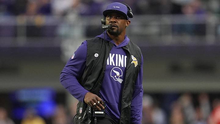 Jan 4, 2026; Minneapolis, Minnesota, USA; Minnesota Vikings defensive coordinator Brian Flores looks on against the Green Bay Packers during the fourth quarter at U.S. Bank Stadium. Mandatory Credit: Matt Blewett-Imagn Images Jan 4, 2026; Minneapolis, Minnesota, USA; Minnesota Vikings defensive coordinator Brian Flores looks on against the Green Bay Packers during the fourth quarter at U.S. Bank Stadium. Mandatory Credit: Matt Blewett-Imagn Images