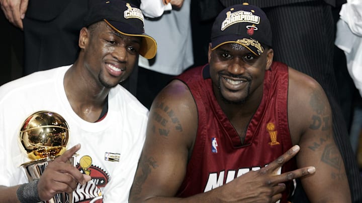 Dwayne Wade (L) and Shaquille O'Neal (R)
